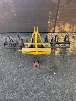 Cultivator for tractor implement