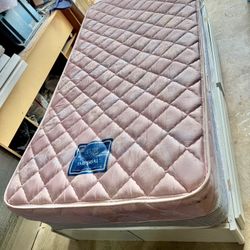 Twin Serta bed with drawers in base