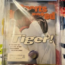 8.5 Graded Tiger Woods Magazine  ( 1st Cover ) 