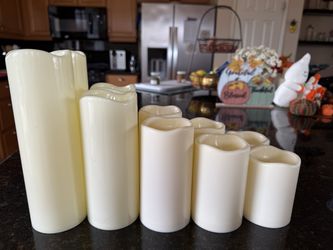 10 Flameless LED Pillar Candles + 2 Remotes - $25 for All