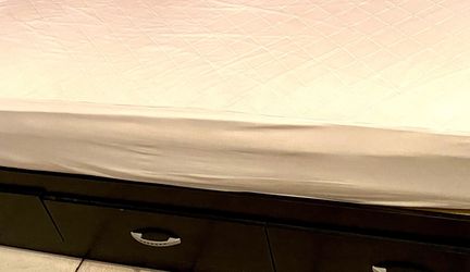 Two twin beds frames with three storage draws each and two NEW mattresses twin size