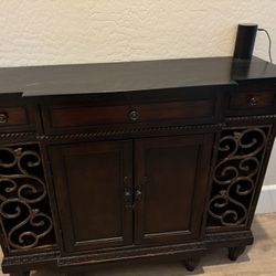 Accent table with cabinets and drawers