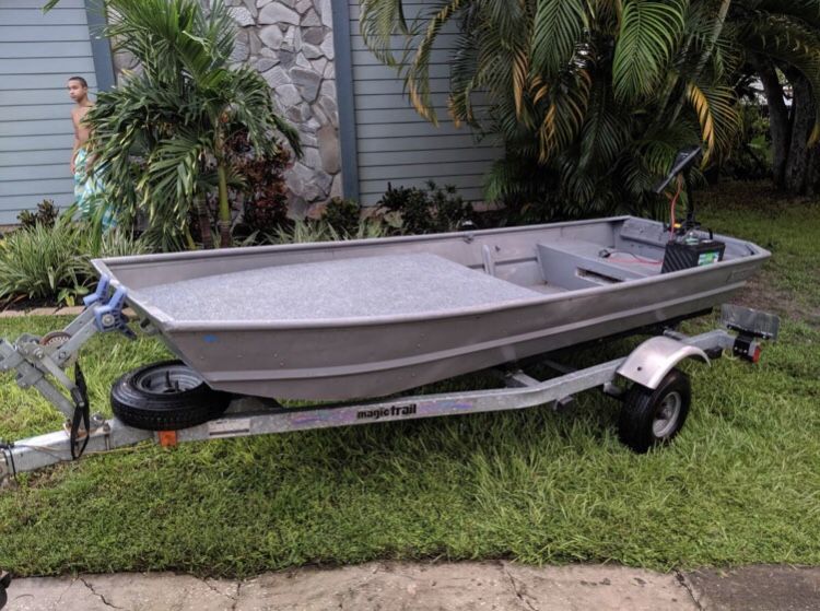 12 foot Jon boat with trailer and trolling motor