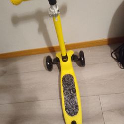 Yellow children's three scooter brand new