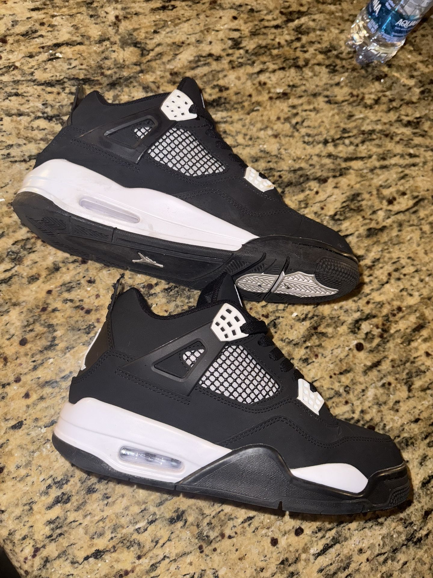 White Thunder Jordan 4’s