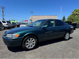 1998 Toyota Camry LE  Looking for dependable transportation? This well-maintained Camry is known for its reliability and fuel efficiency. It runs and 
