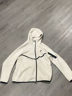 L Nike teach