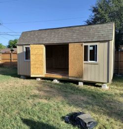 16x20 barn style shed  storage includes :1 loft , 1 set of double shed doors, 2 double glass windows with flynet