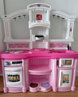 Pink toy kitchen step 2