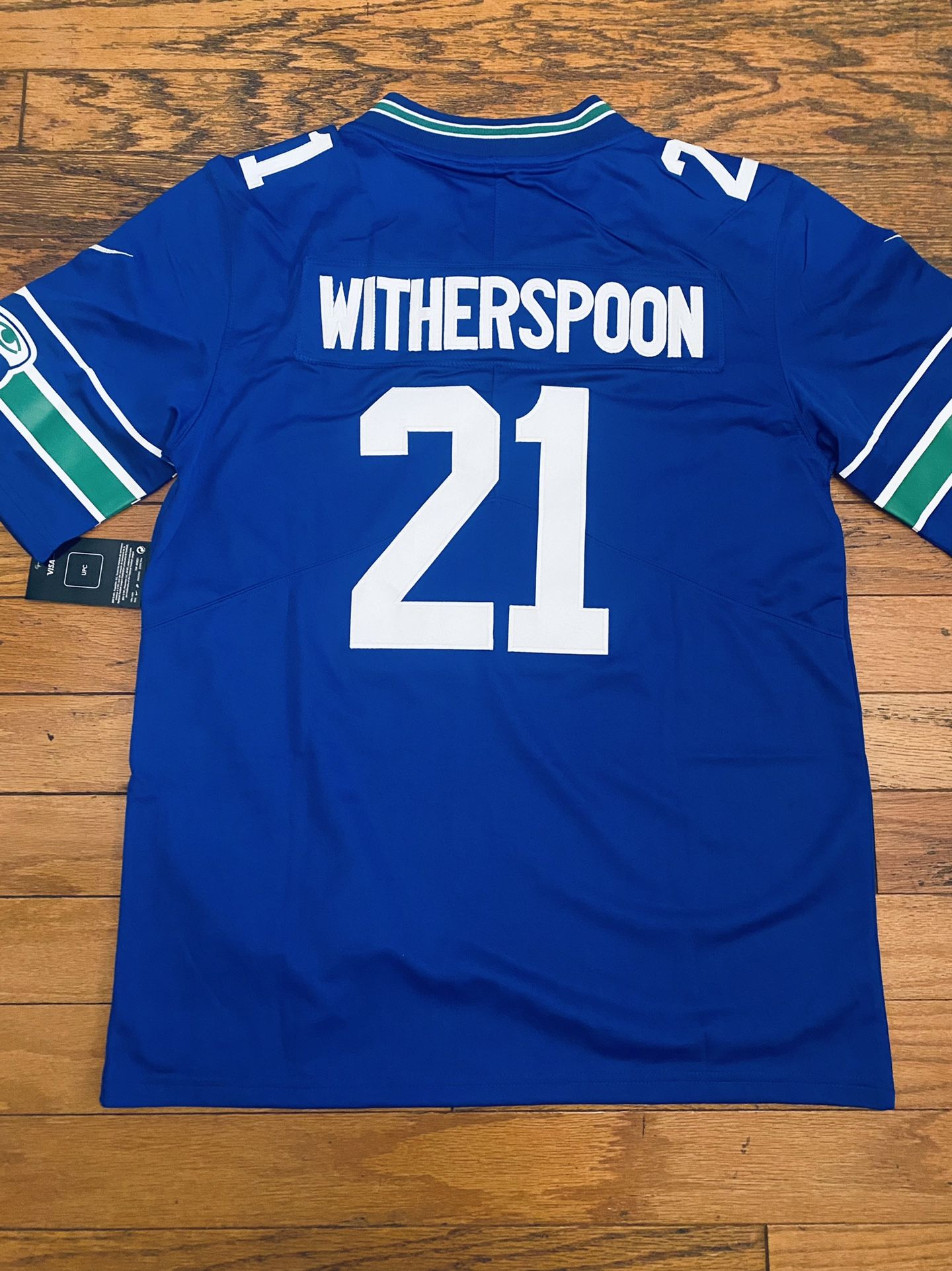 Small blue Seattle Seahawks Devon Witherspoon royal throwback jersey
