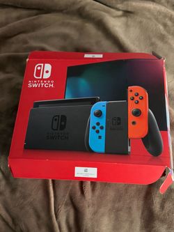 Nintendo Switch With Neon Blue and Neon Red Joy Con Gaming Console