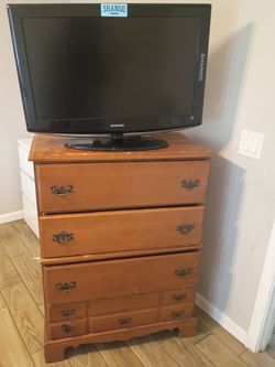 5-drawer wooden dresser — $65 , 32" Samsung Smart TV — $40