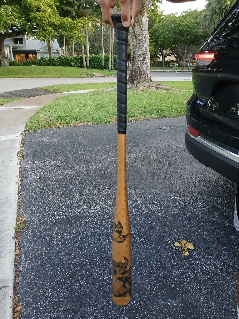 DeMarini Voodoo One Gold Bat
