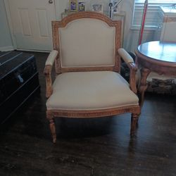 Two Carved Excellent Condition Wing Back Chairs And Side Table 
