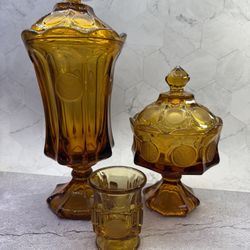 Gorgeous lot of vintage Amber Fostoria Glass Company's "Coin Pattern" line, also known as Model #1372. Footed Urn with Lid, Compote Candy Dish with li
