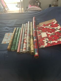 Christmas themed wrapping paper rolls