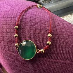 Green Glass And Gold Filled Charm On And Adjustable Thread Bracelet 