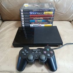 Late Slim Playstation 2 ps2 with contoller memory card plus 10 games