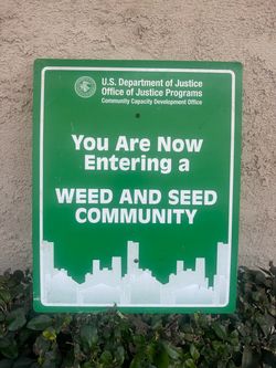 Weed and seed community metal sign