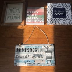 Wooden bathroom signs