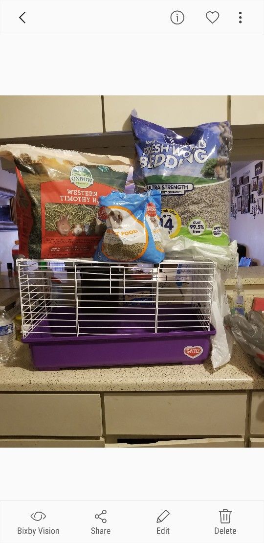 rabbit bedding, cage, rabbit pellets... its open but used once. for Sale in San Antonio, TX