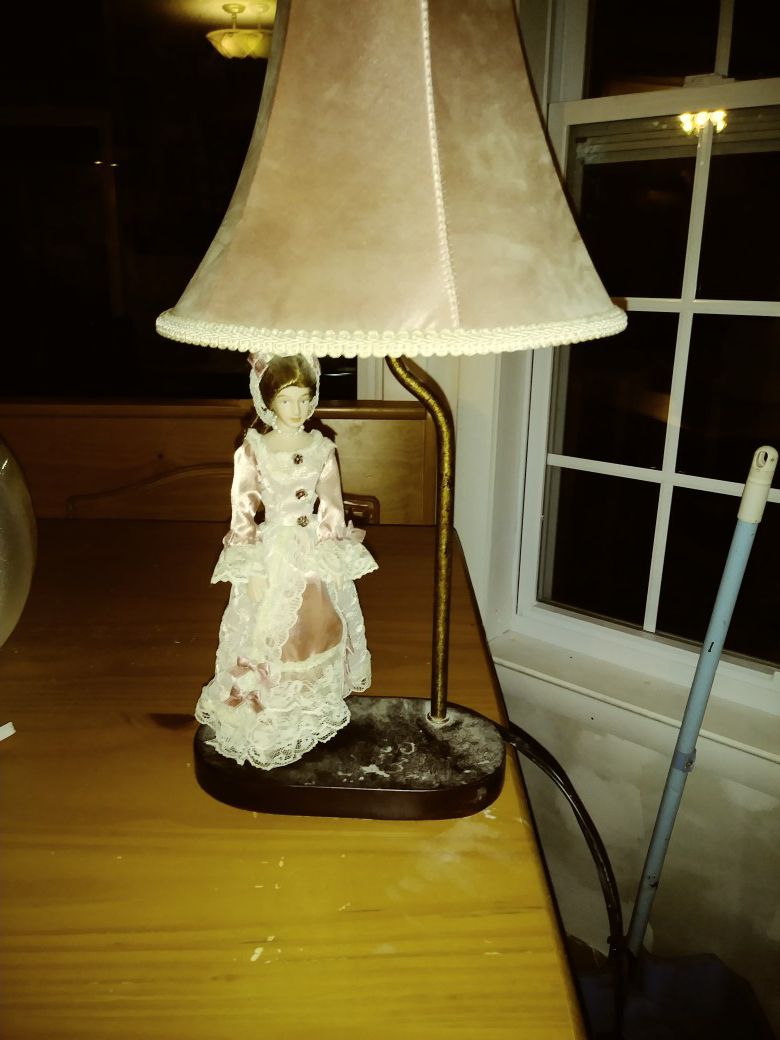 Beautiful porcelain doll lamp