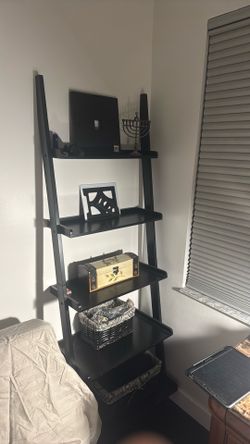 Black  ladder book shelf