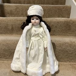 Winter porcelain Doll 17” tall w stand