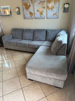 Beautiful light Grey sectional couch from Ashley furniture