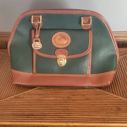 Dooney and Bourke pocket book. New condition