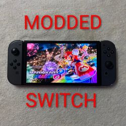 NINTENDO SWITCH OLED VERSION with 7500 GAMES