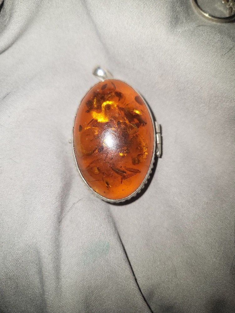 Sterling Silver And Amber Locket