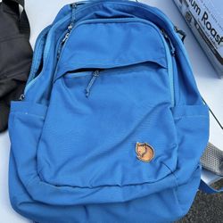 BLUE ZIP UP BACKPACK