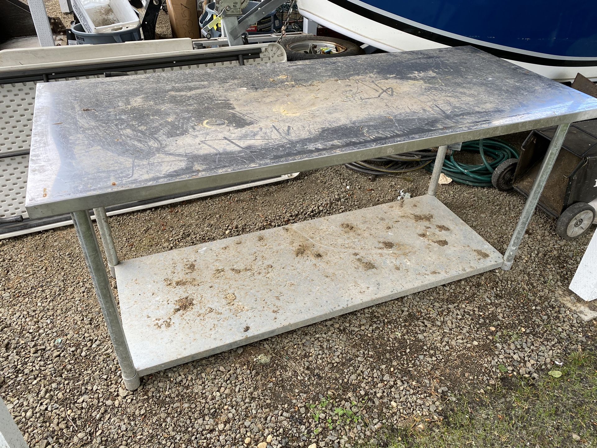 Stainless steel table, perfect for outside or gardening even a filet table