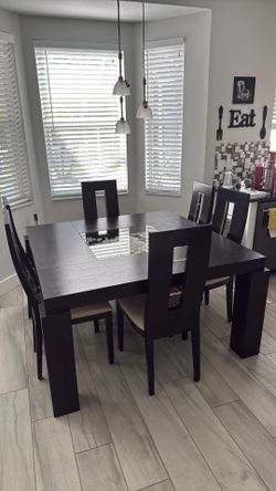 Dark brown table and chairs set