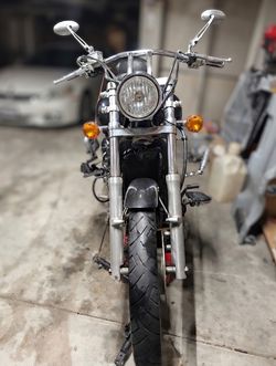2007 Black Kawasaki Vulcan 900 Motorcycle selling for parts