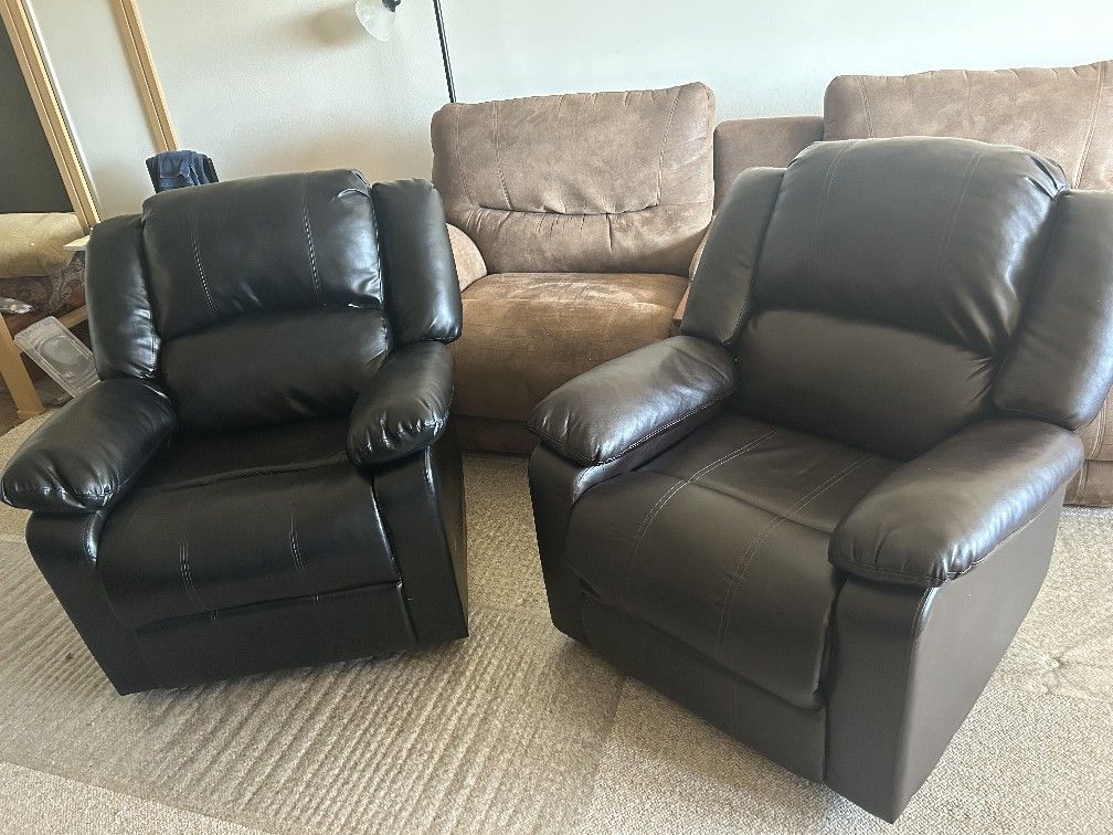 Two FAUX Leather Recliners - 1 Black, 1 Brown SOLD TOGETHER