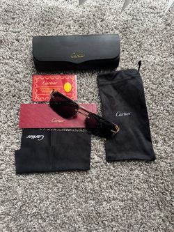 Cartier rimless sunglasses gold with black lenses