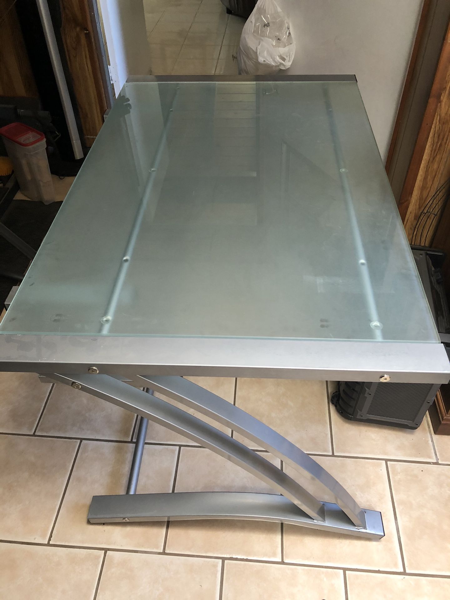 Glass desk with computer shelf