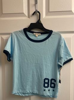 Brand new Juniors light blue tee size M