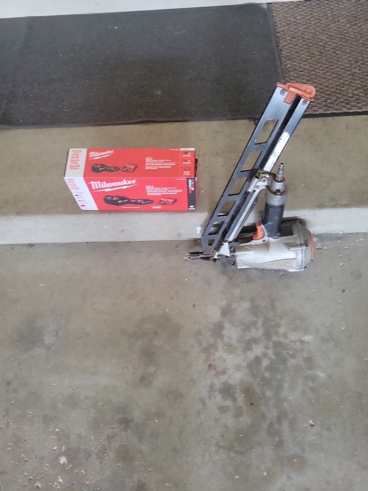 Milwaukee M18 Batteries and Charger Also Paslode Framing Nailer