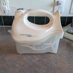 Hamilton Beach Power Deluxe 6-Speed Electric Hand Mixer with a snap-on storage case, model 62695V