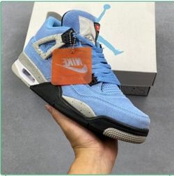Air Jordan 4 University Blue Sneakers