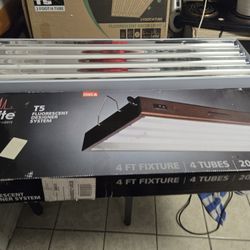 Agrobrite T fi fluorescent designer system four foot fixture for tubes twenty thousand luminants, as well as a two foot 42 t five full resting curl li
