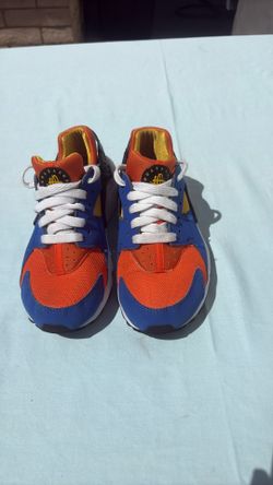 Nike Huarache Run GS Sneakers In The Hyper Royal, Safety Orange, And Yellow Ochre Colorway
