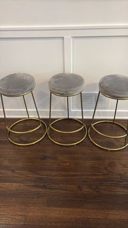 3 soft gray velvet counter Stools
