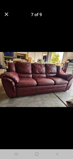 Burgundy leather couch mint condition. No rips or stains. Pet free. Retailed for $2800. Ill take $200 non negotiable. 7o2//285--776four