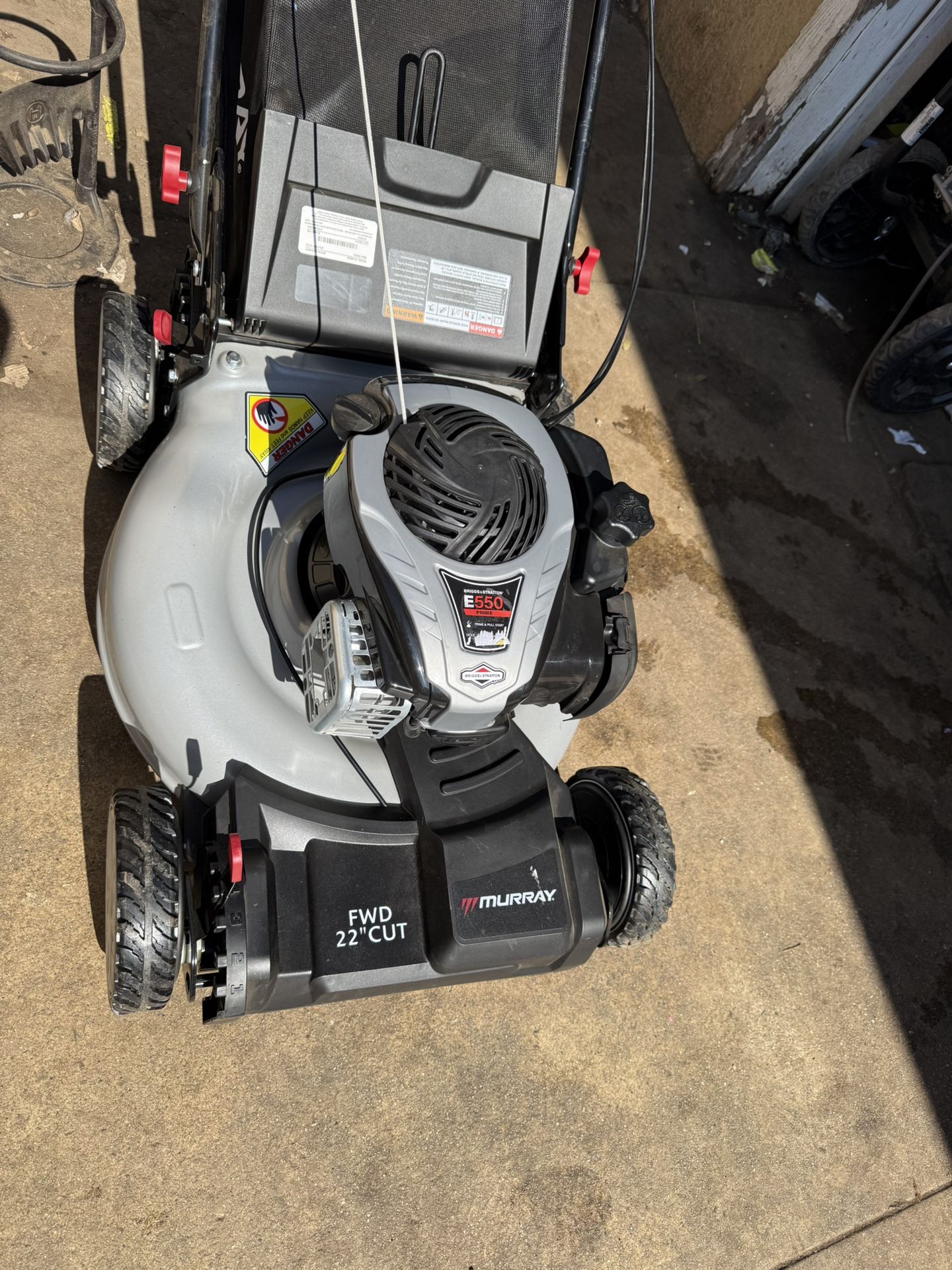 22 in. 140 cc Briggs & Stratton Walk Behind Gas Self-Propelled Lawn Mower with Front Wheel Drive and Bagger by Murray