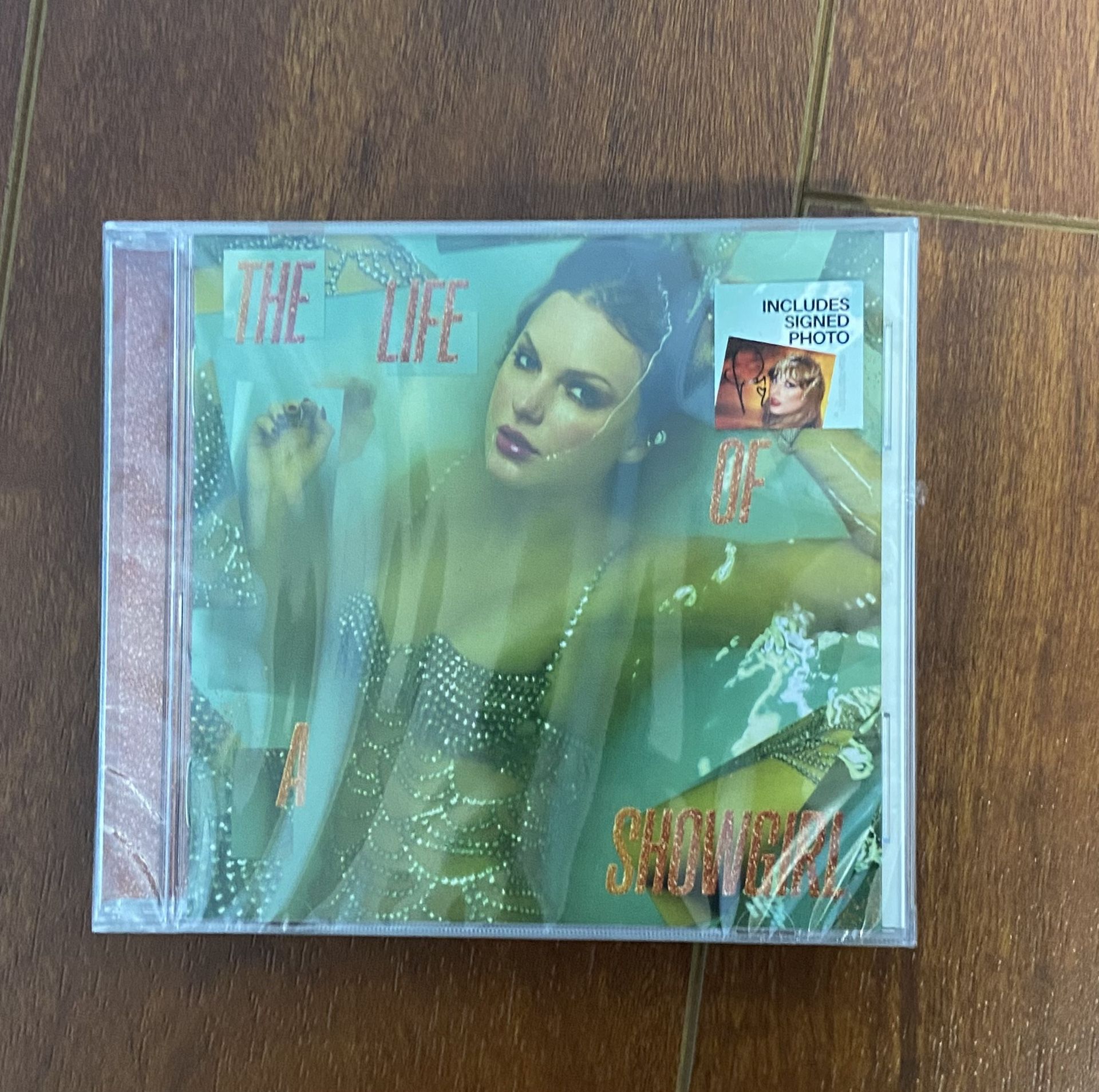 Taylor Swift The Life of a Showgirl CD + Hand Signed Photo 1