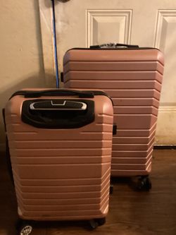 Pink /rose gold suitcase